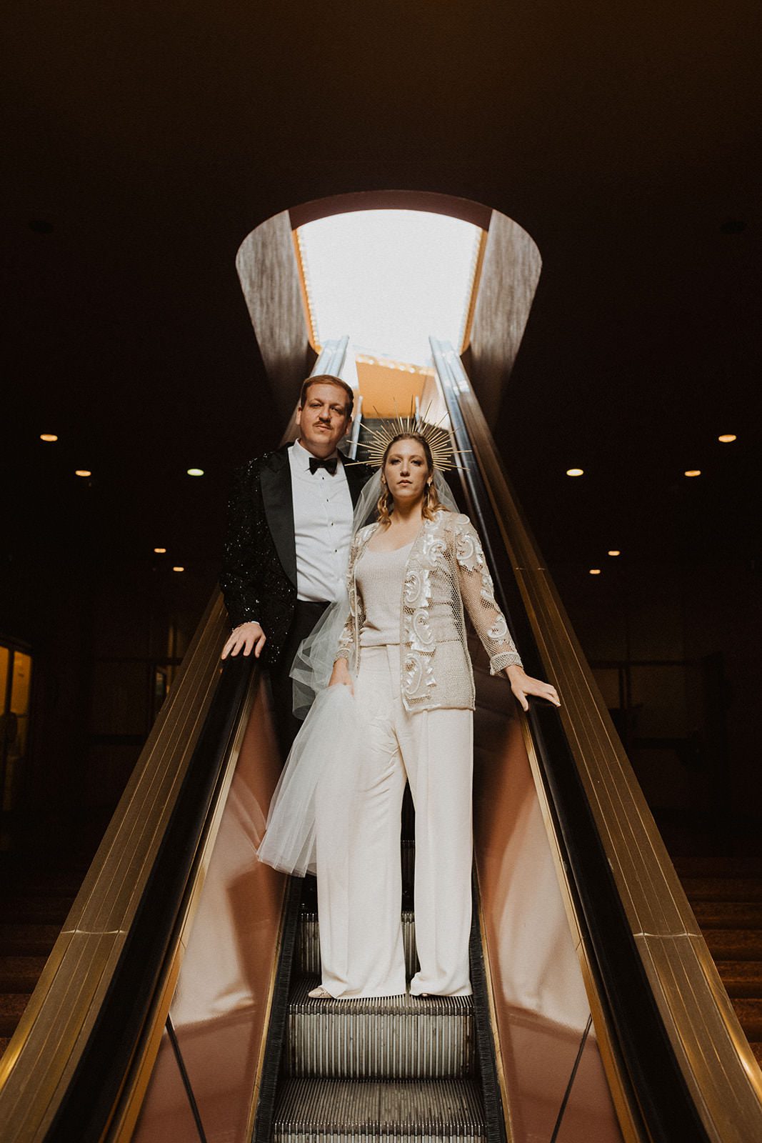 Couple portrait inside Marin County Civic Center highlighting Frank Lloyd Wright architecture and beautiful lines
